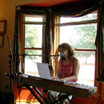 Likely Stories - Nancy Rost at the piano